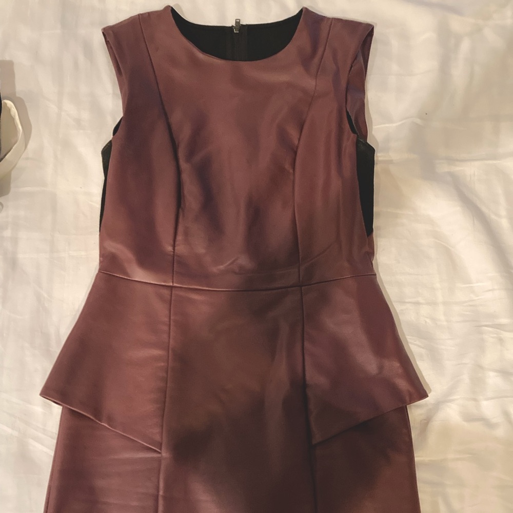 Burgundy colored BCBG Generation size 2. Awesome fitted dress.